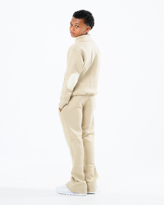 Gate 01: The Classic Flares — Check-In: Holiday Edition Beige  Toddler/Youth